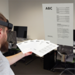 Documents in Your Hands: Exploring Interaction Techniques for Spatial Arrangement of Augmented Reality Documents