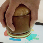 HANDle: A Novel Tangible Device for Hand Therapy Exergames